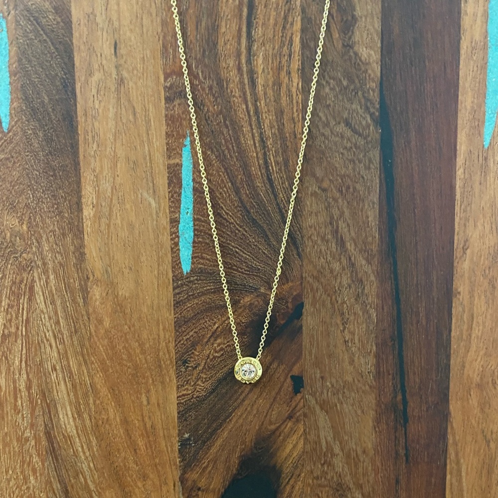 Gold COACH necklace with light pink gem. 16 in with 2 1-in extensions